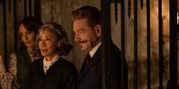 Hercule Poirot (Kenneth Branagh) tenta desmascarar a médium interpretada pela oscarizada Michele Yeoh