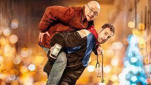 O m&eacute;dico Serge recorre ao entregador Malek para atender pacientes no Natal em Paris