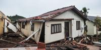 Casa destruída por enchentes em Roca Sales