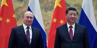 Presidentes da Rússia, Vladimir Putin, e da China, Xi Jinping 