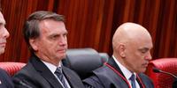 O presidente Jair Bolsonaro e o ministro Alexandre de Moraes, do TSE